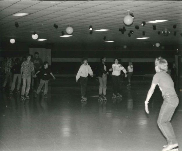 Christmas Skating Party showing people skating