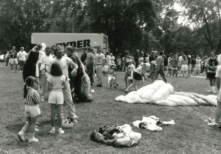 Black and white photo of families at the 1990 Lake Picnic