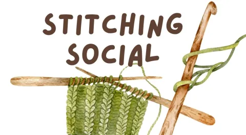 Stitching social title with a crochet hook and knitting needles with green yarn