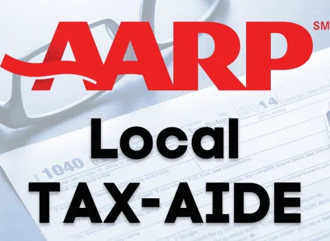 AARP Local Tax-Aide overlaid on a close-up of a tax form