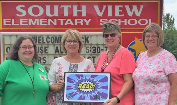 Librarians in front of South View Elementary School